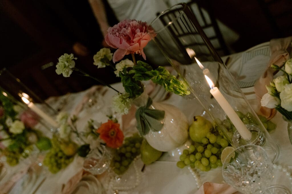 Romantic wedding tablescape at the cottage core wedding reception in Rivers Edge Resort Manitoba.