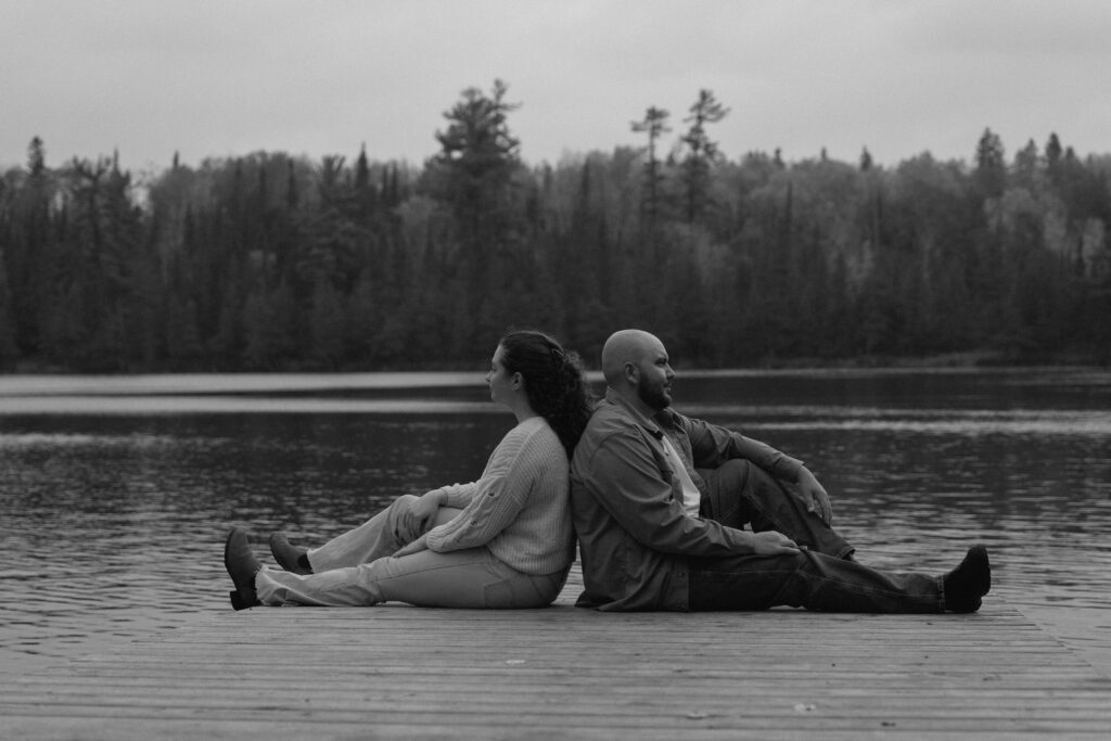Cinematic photo of a couple on a dock at Hunt Lake
