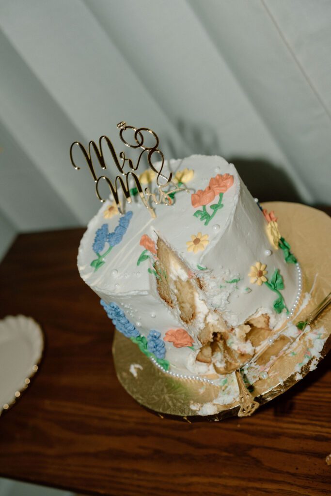 cut wedding cake at the St. Norbert Arts Center in Winnipeg
