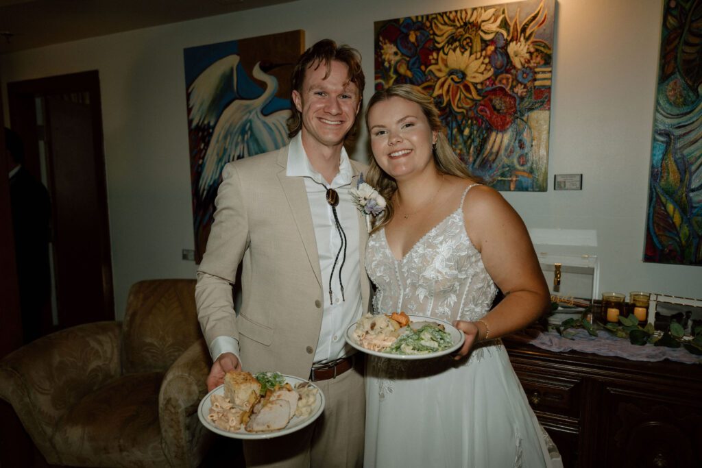 bride and groom enjoying their first meal together 
