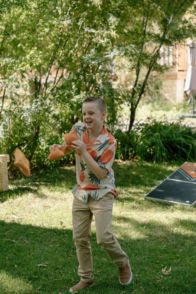 playing yard games at a wedding