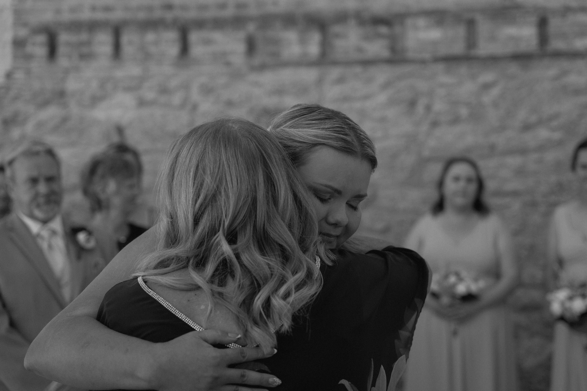 bride hugging mom and crying in the aisle at the Trappist Monastery Provincial Heritage Park