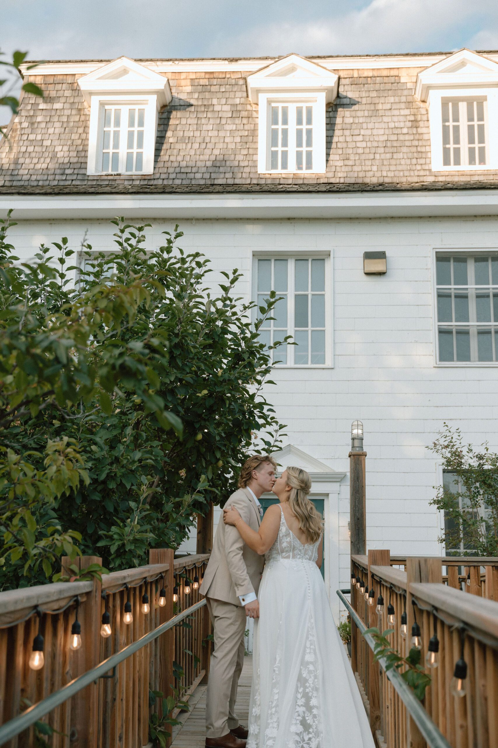 bride and groom kissing at a wedding at the St. Norbert Arts Center