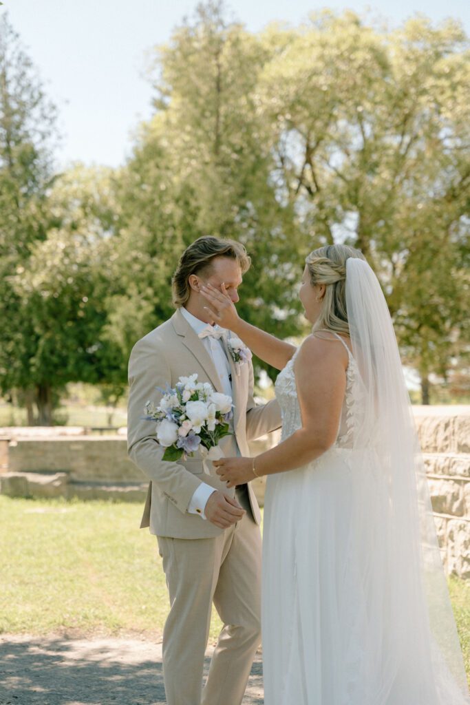 First look with bride and groom at the st norbert arts center