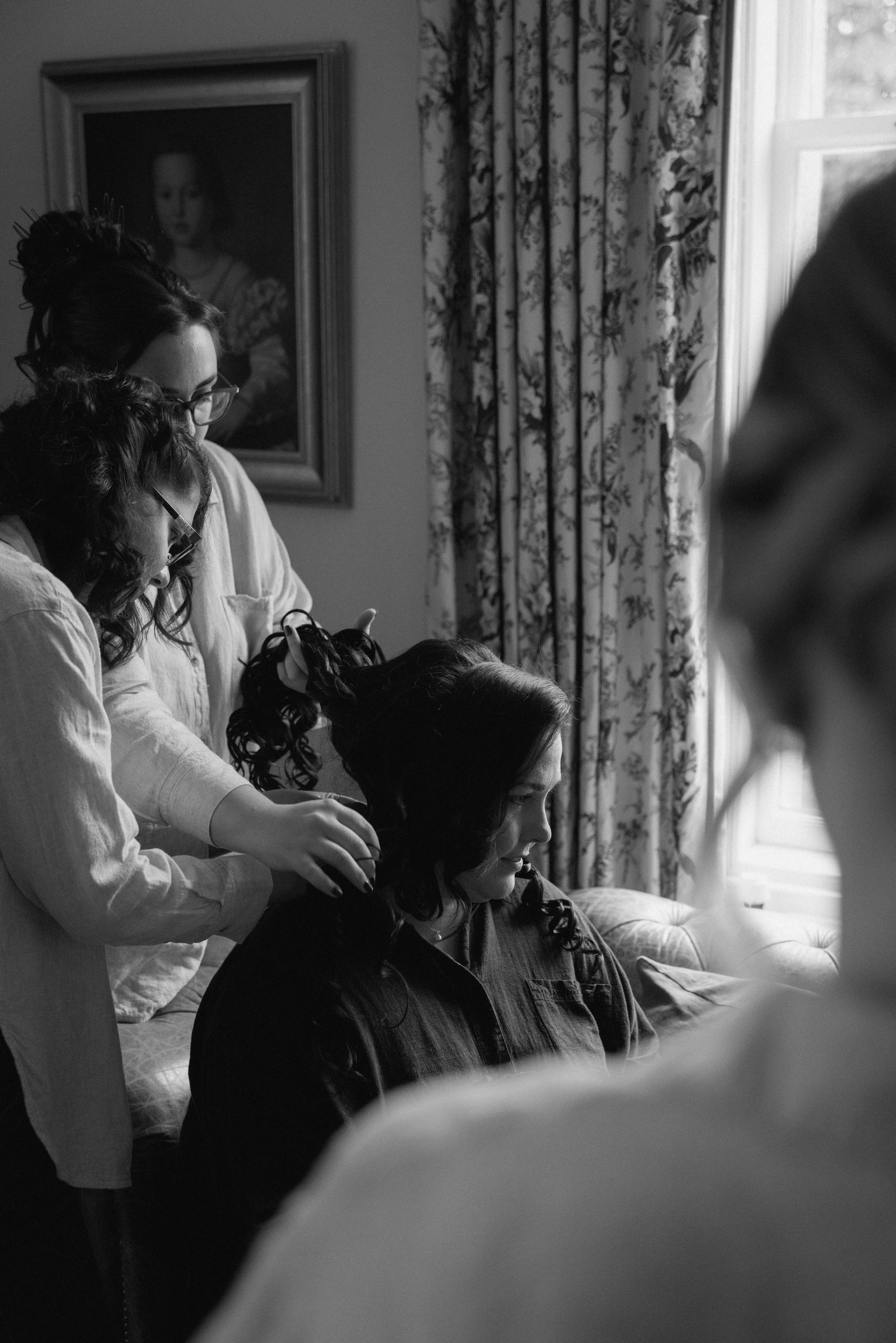 Documentary-style bridal photography at Elsick House featuring the bride in soft natural light during a calm wedding morning in Scotland.