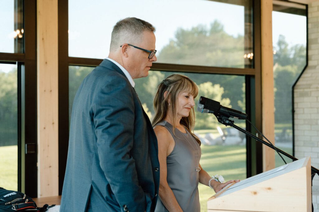Cole's parents giving a wedding reception speech during Julianna and Cole's celebration at The White Poplar