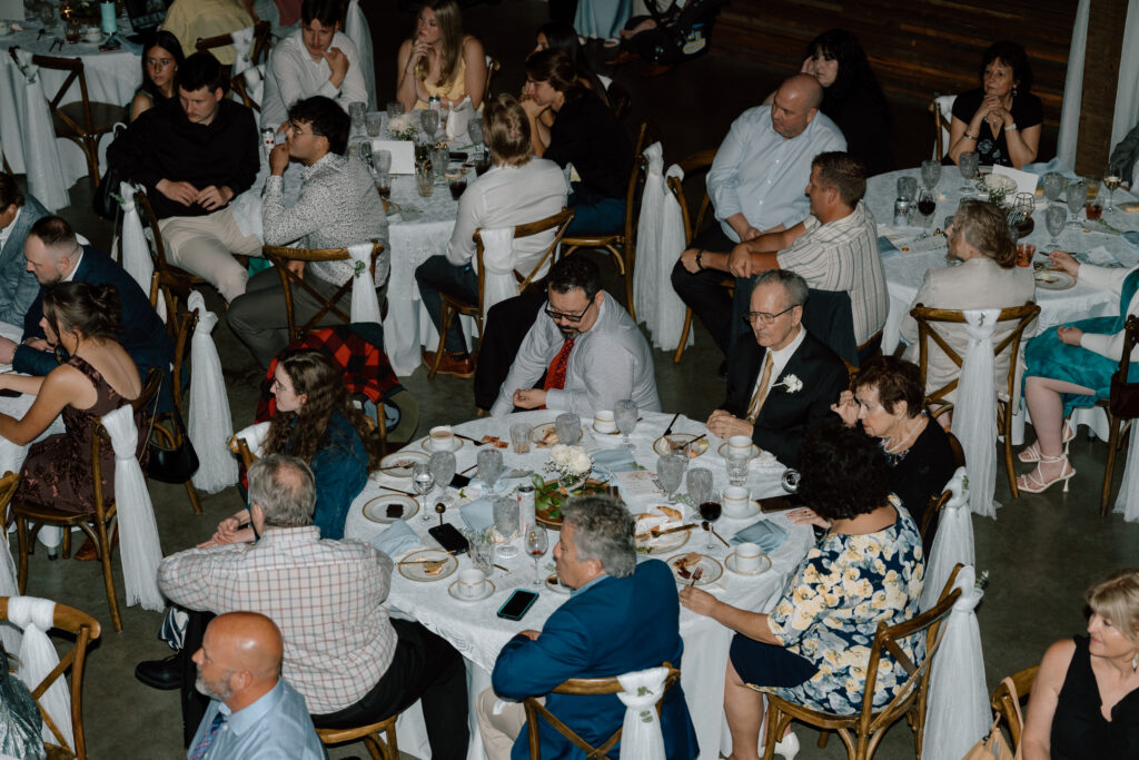 Wedding guests enjoying the reception at Hawthorne Estates in Manitoba
