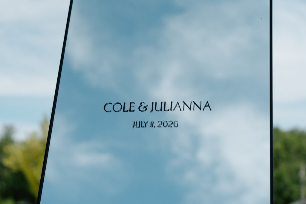 Julianna and Cole's wedding day details reflected in a full-length mirror at The White Poplar in Manitoba